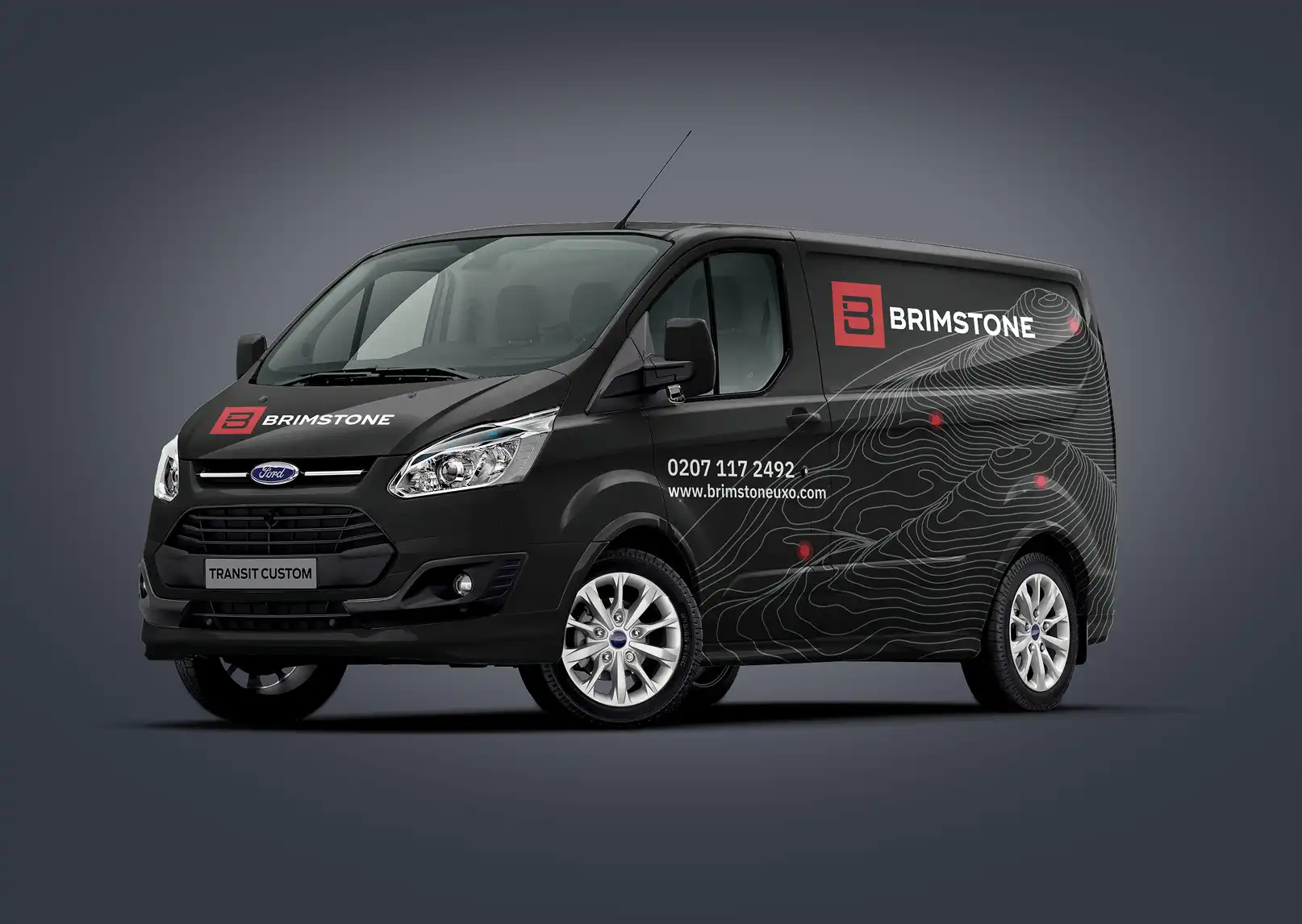 A dark coloured van with Brimstone livery